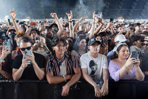 Fans of Kid Cudi cheer during his performance in the Sahara tent during the Coachella Valley Music and Arts Festival in Indio on Sunday, April 21, 2024. (Photo by Drew A. Kelley, Contributing Photographer)