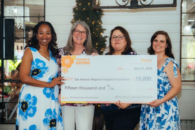 The San Antonio Regional Hospital Foundation receives a grant for its Women Caring for Women Program. From left, Nefertiti Long, Michelle Stoddard, Laura Carbajal and Teri Wiley. (Courtesy of Inland Empire Community Foundation)