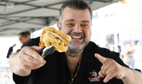 Charlie Boghosian of Chicken Charlie’s, hold out his hot honey funnel cake chicken sandwich. and funnel cake sandwich, during an LA County Fair preview on Wednesday, May 1, 2024. The fair is set to open its doors on May 3rd, 2024. (Photo by Anjali Sharif-Paul, ɫ̳/SCNG)
